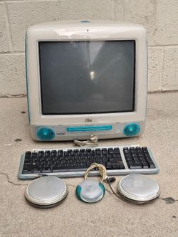 Apple iMac G3 in Bondi Blue, "Nearly bankrupt, Apple's official turnaround with the return of co-founder Steve Jobs in 1997