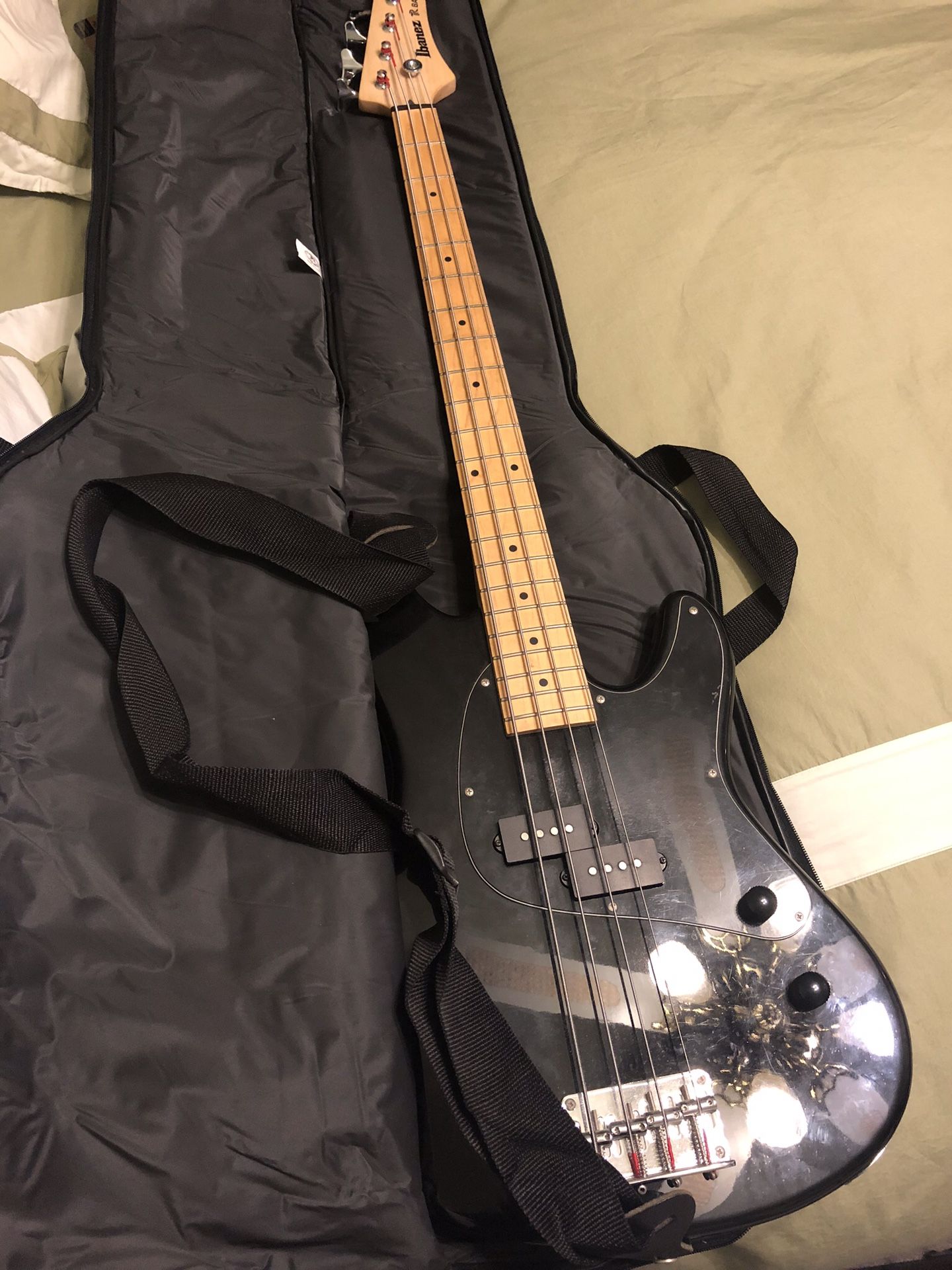 Ibanez bass guitar TR 50 series with shoulder strap, carrying case and amplifier