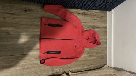 red nike tech jacket