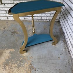 Teal and gold table