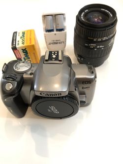 Special Sale:$55. From  $79. Canon EOS Rebel K2 film Camera with EF 20-90 mm Lens with film, battery but no charger