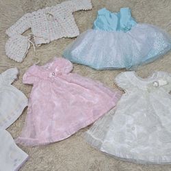 Beautiful Four Fancy Baby Dresses (size 0-3 months)