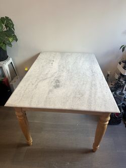 Anthropologie marble dining table $650