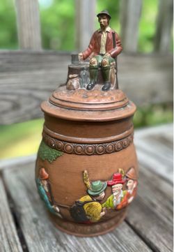 Antique beer mug with very detailed scenery