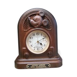 This is a vintage 1987 Seiko Quartz Mickey Mouse 60th Anniversary alarm clock.  It was produced in 1987 to celebrate Mickey Mouse's 60th anniversary. 