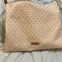 MK  purse  Medium brown n beige 