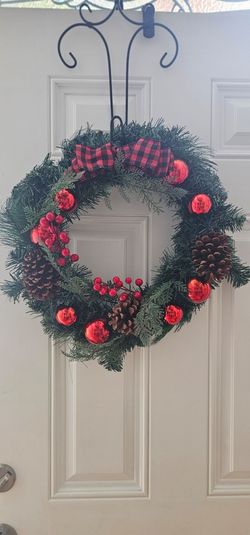 Christmas Wreath with Red Ornaments and Pinecones