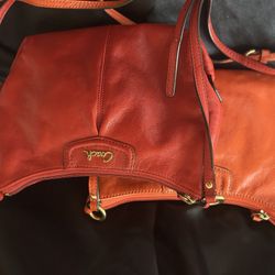 Red/Peach/Coral leather Coach Saddle bag