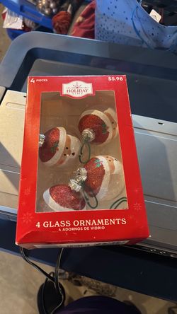 Four glass ornaments, Santa Claus