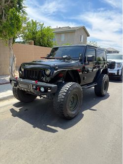 2013 jeep wrangler Sahara 4x4 2 door salvage title