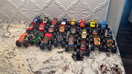 24 Hot Wheels Monster Jam 1:64 Monster Trucks Good to Excellent condition SEE PHOTOS AND VIDEO Purchased new 2013 thru 2019 Used definitely not abused