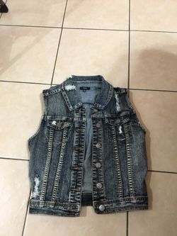 Distressed jean vest