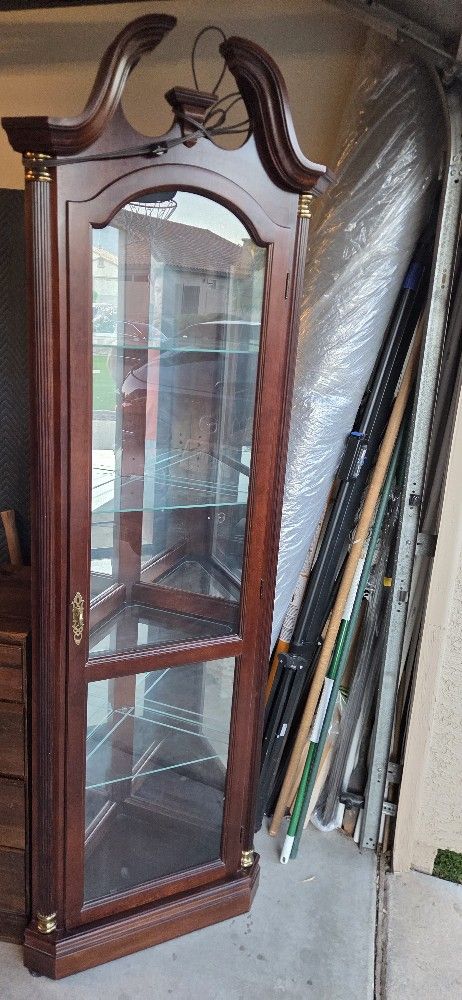 Beautiful corner curio cabinet