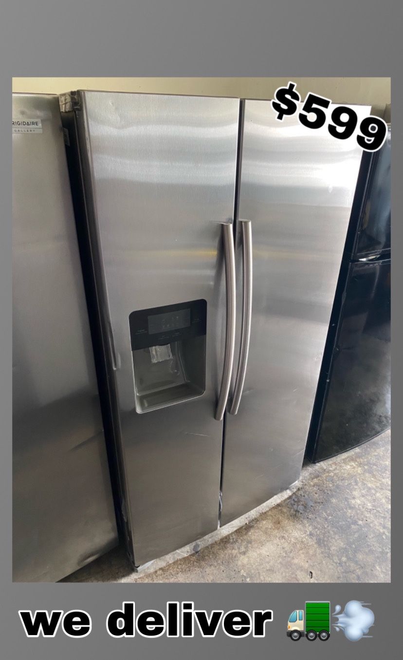 SAMSUNG STAINLESS SIDE BY SIDE FRIDGE