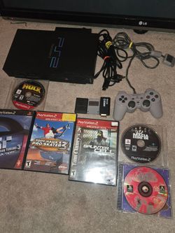 Playstation 2 fat with games