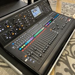 Midas M32 with Road case.  