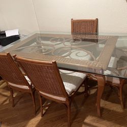 Glass dining table with all chairs