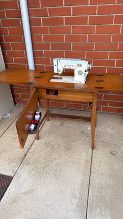 White Sewing Machine with Cabinet