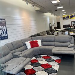 Black Friday sale starts now. Alejandra gray reclining sectional only $1599. Easy finance option. Same-day delivery.
