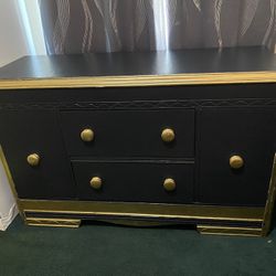  $180- (firm on price)1 Black and gold Vintage dresser! Lots of storage space behind each side door. H-2‘10“ X L 4 ft 4 1/2” X D 1‘7“  Comes from clea