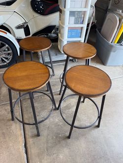 4 Industrial stools wood seat and black wrought iron base like new $80 for all Gilbert and Ray rd. Check pics and offers.