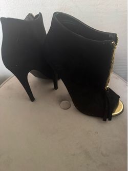 Black and gold heels