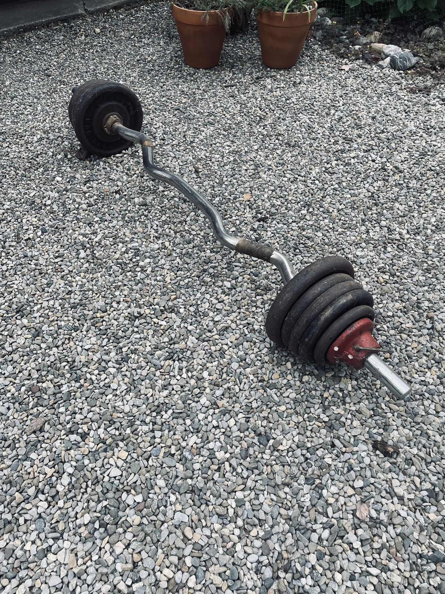 Vintage York Curling and Triceps bar with 55# plates and collar