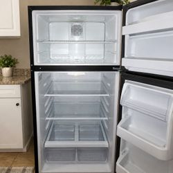 GE Appliances 17.5 Cu. Ft. Top-Freezer
Refrigerator.