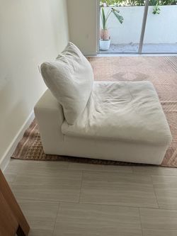 Nixon white fabric armless chair