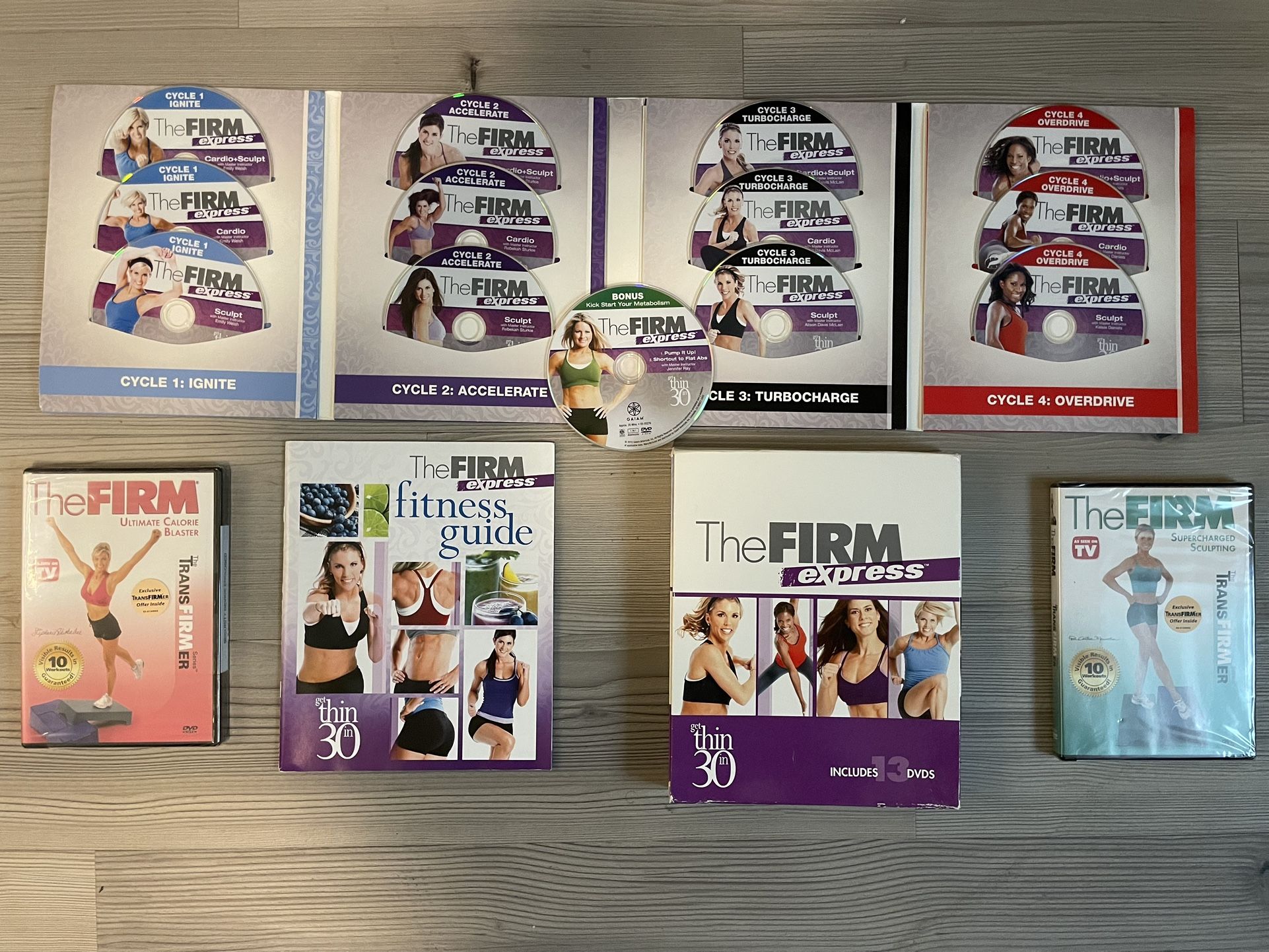 The FIRM Workout DVDs w/ a Fitness Guide
