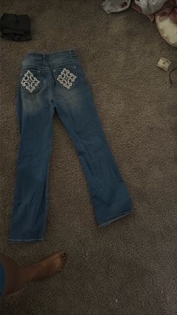 Jeans with cross design on back bell bottom stretch