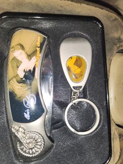 Elvis Presley knife and key chain never been used brand new still in the case