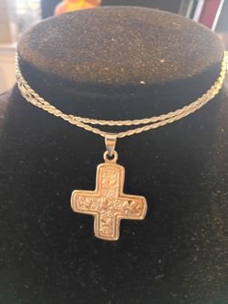925 Italy rope chain 23 in Long with a 925 pure silver cross $220 cash