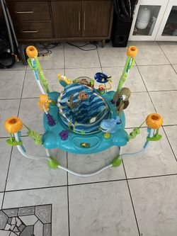 Bright Starts Disney Baby Finding Nemo Sea of Activities Baby Activity Center Jumper with Interactive Toys, Lights, Songs & Sounds, 6-12 Months (Blue)