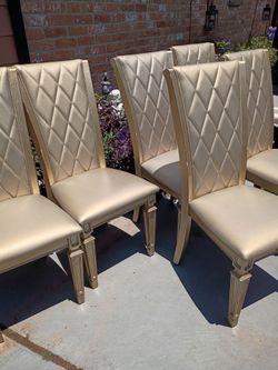 Six heavy duty wood chairs normal wear asking $100 for all