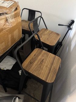 5 bar height stools with backs and one without