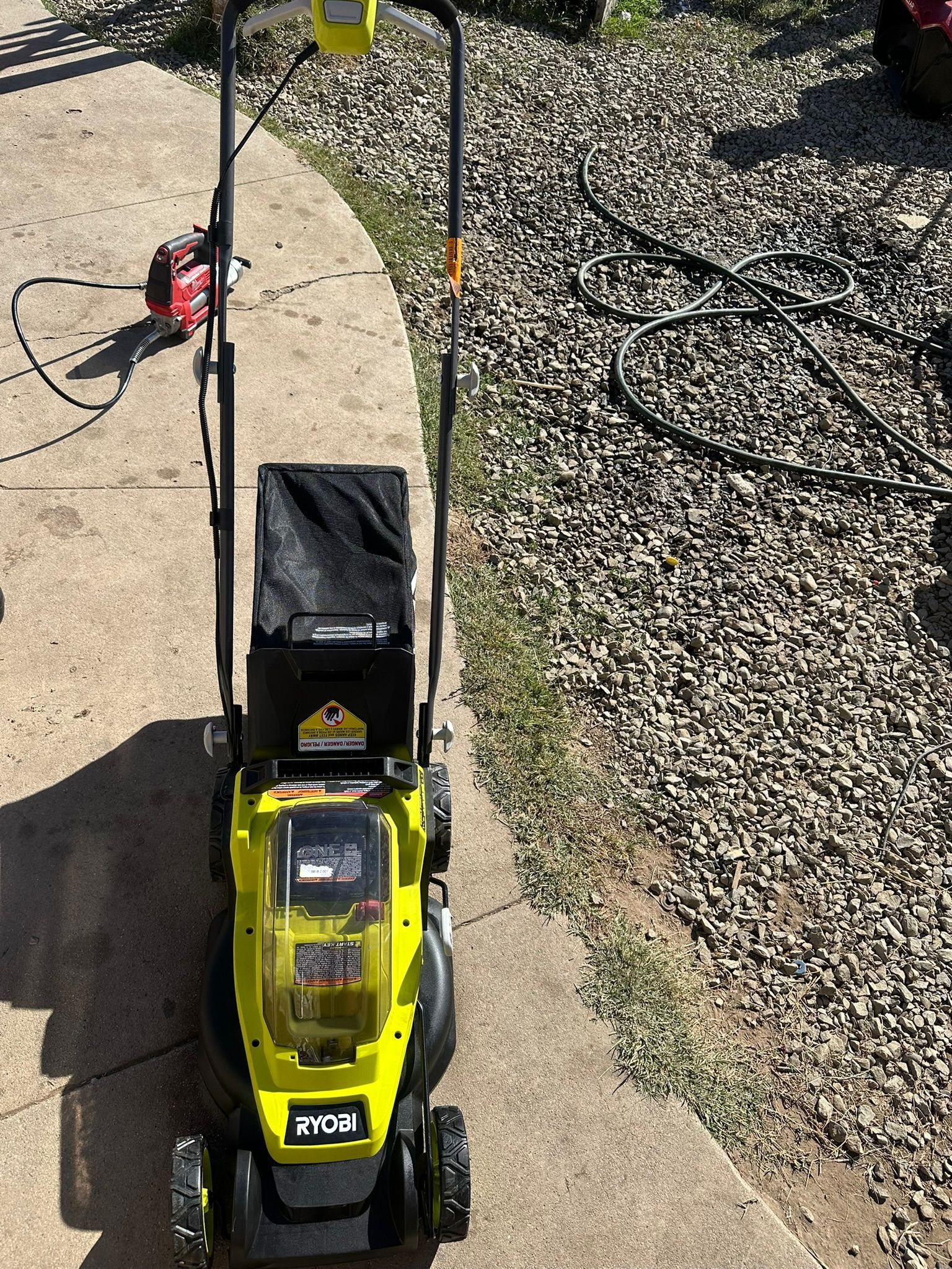 RYOBI ONE+ 18V 13 in. Cordless Battery Walk Behind Push Lawn Mower with 4.0 Ah Battery and Charger