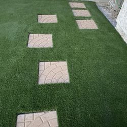 installation of artificial grass and pavers