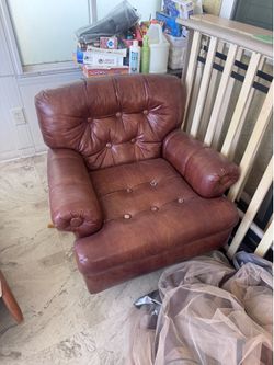 Swivel rocking leather chair