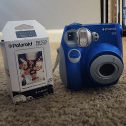 Blue Polaroid w/ film 