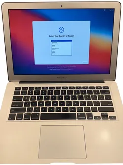 MacBook Air 13 in with charger I can deliver