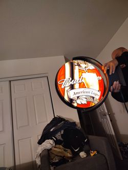 Budweiser sign lights up and moves 200
