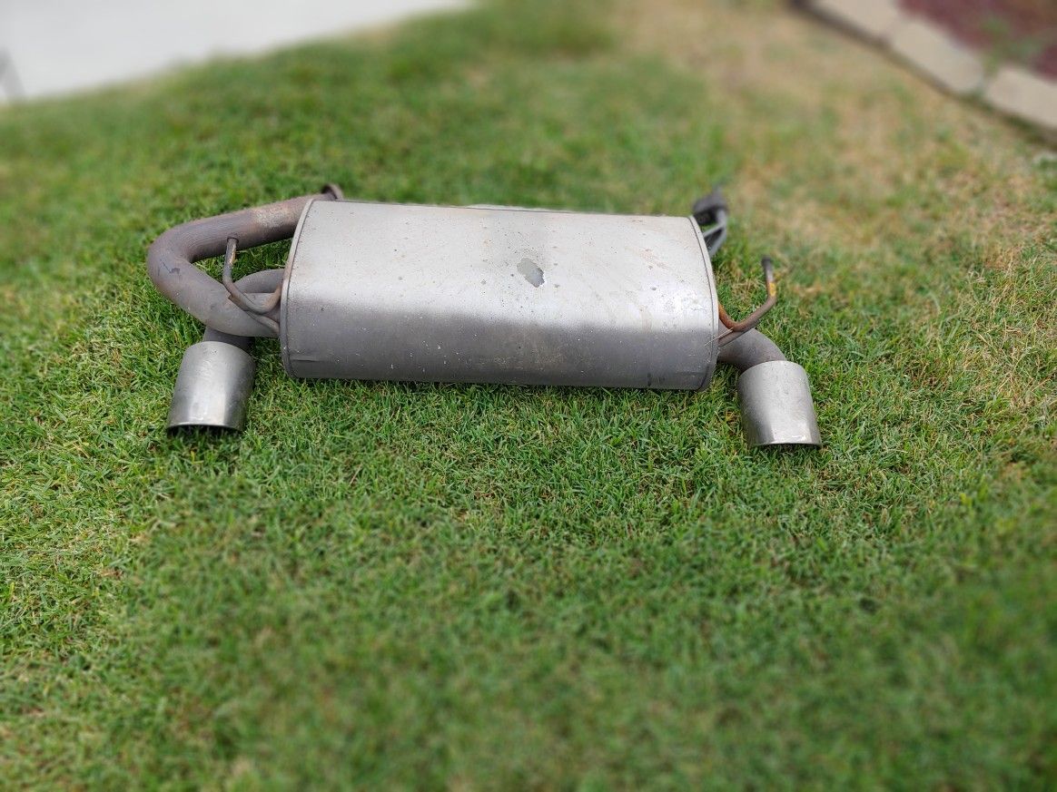 Nissan 350Z OEM muffler with chrome tips and a Borla resonator