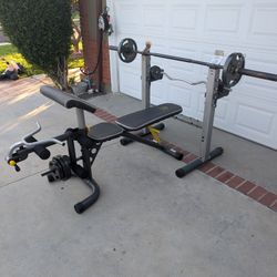 Gold's Gim XRS Weight Bench And Olympic Bar. NO WEIGHTS INCLUDED 