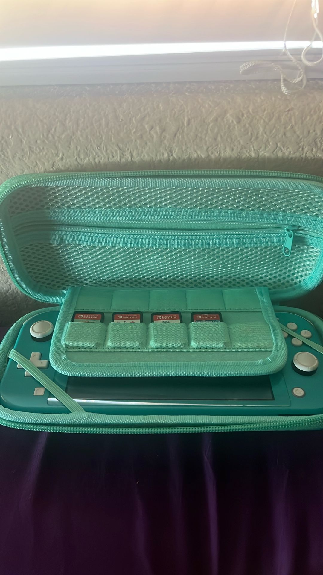 Nintendo Switch Lite with Case, Games And Charger Included