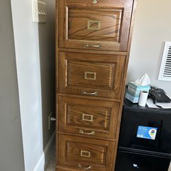 Four Drawer Solid Oak Filing Cabinet With The First Drawer Has A Lock