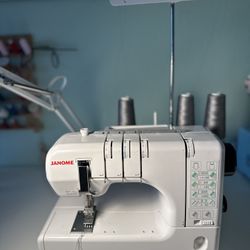 Janome CoverPro 1000CPX Coverstitch Serving Machine 