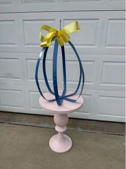 Party decorations. Table and metal display cage