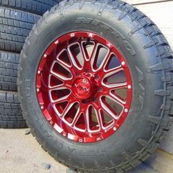 20X10 Worx Candy Red with Milled Rims LT 325 60 20 Nitto A/T 10ply Tires 8X170