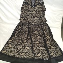 Black lace dress with nude lining.